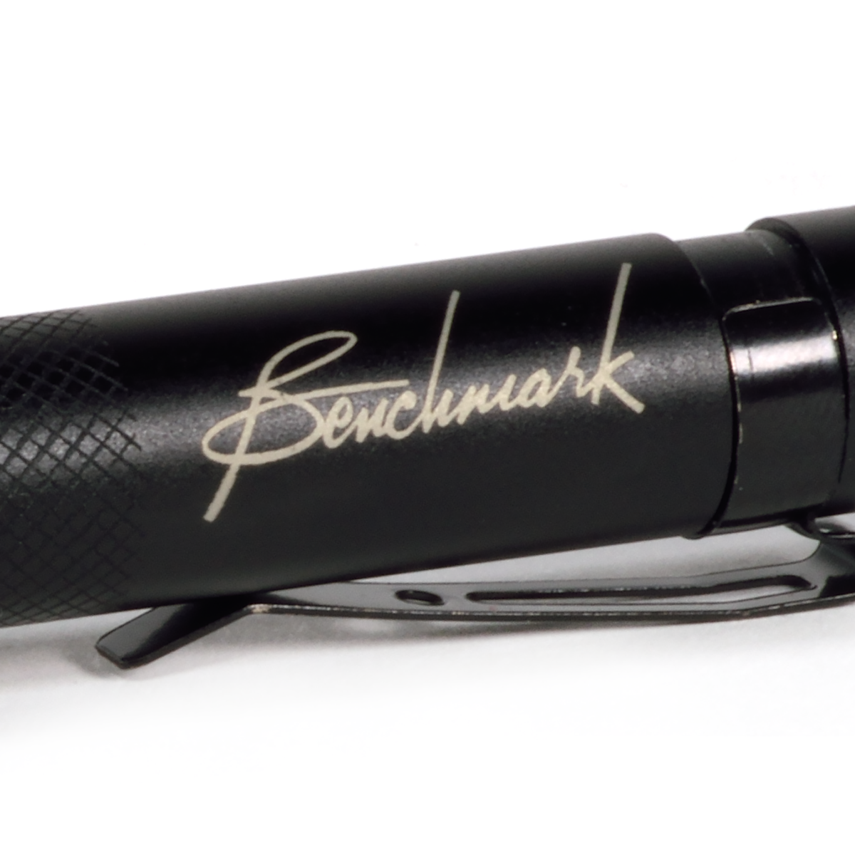 Closeup of laser engraved Benchmark Logo. 