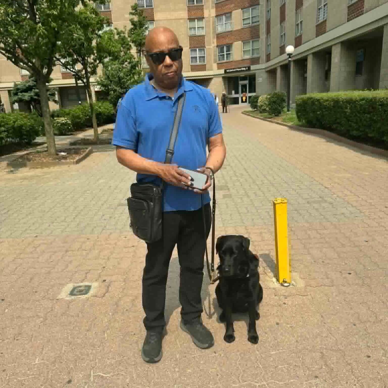 Jazz Vocalist Frank Senior with his guide dog Rigby in New York City
