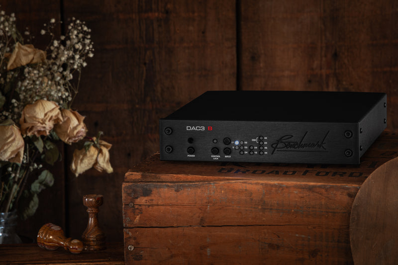 Benchmark DAC3 B on a rustic wooden box