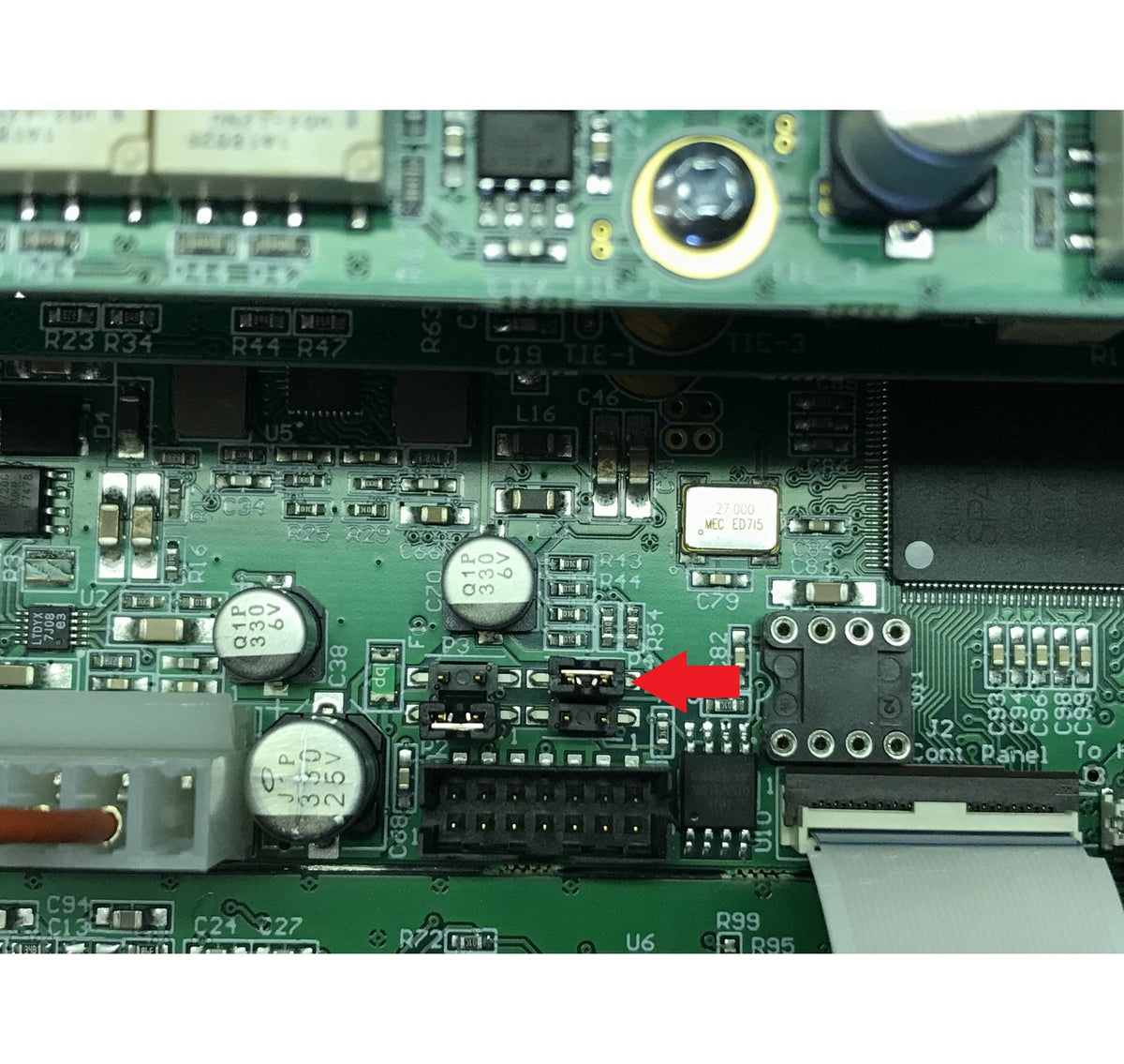 Arrow points to jumper that must be moved